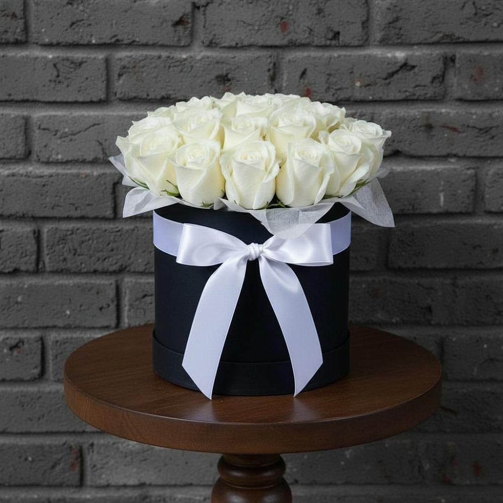 Цветочная композиция из Розы в шляпной коробке в Капустин Яре